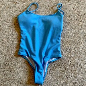Size small one pierce light blue bathing suit